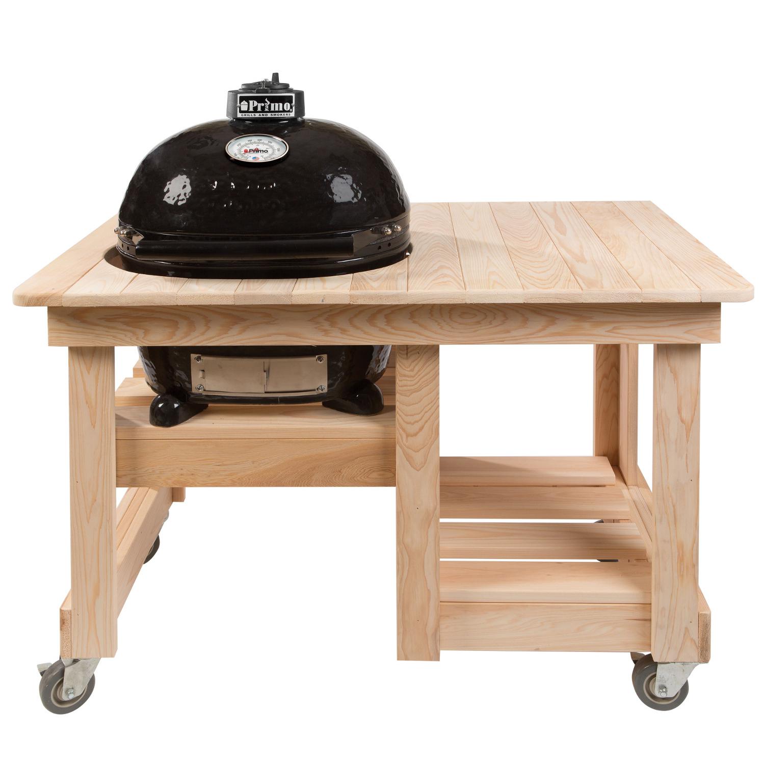 Primo Oval Junior Ceramic Kamado Grill On Countertop Cypress Table