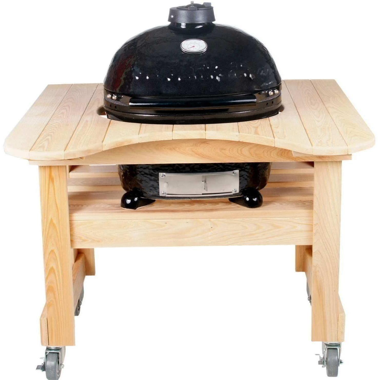 Primo Oval Junior Ceramic Kamado Grill On Curved Cypress Table